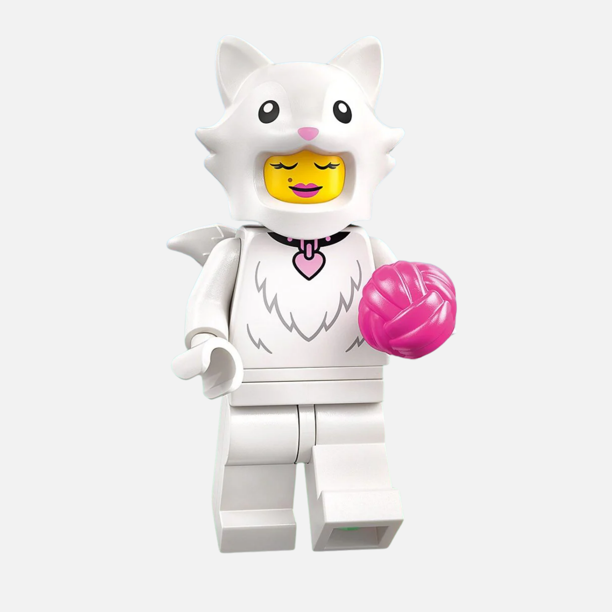 LEGO cat minifigure holding a pink ball on a white background